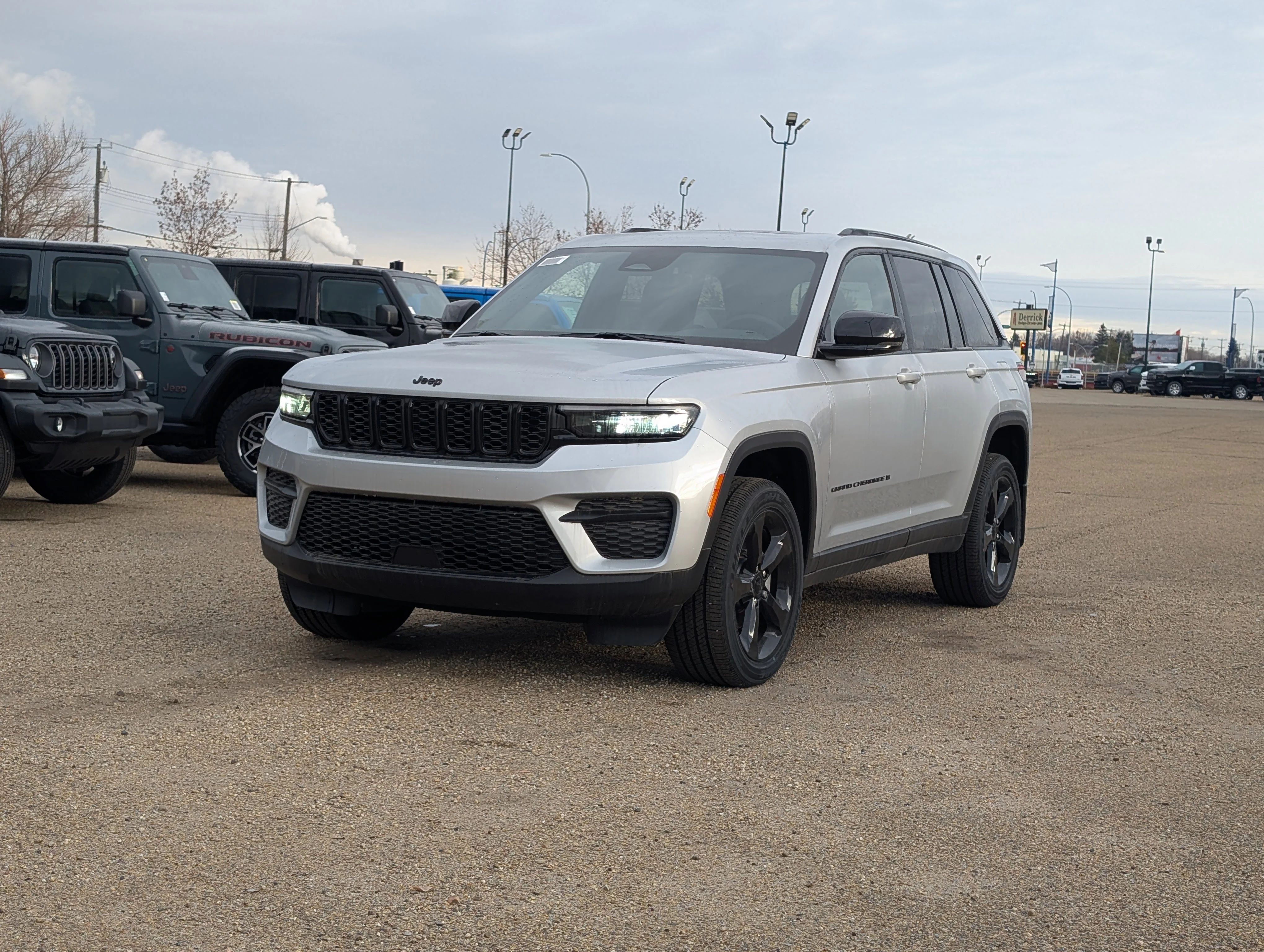 New 2025 Silver Zynith Jeep Altitude image 2