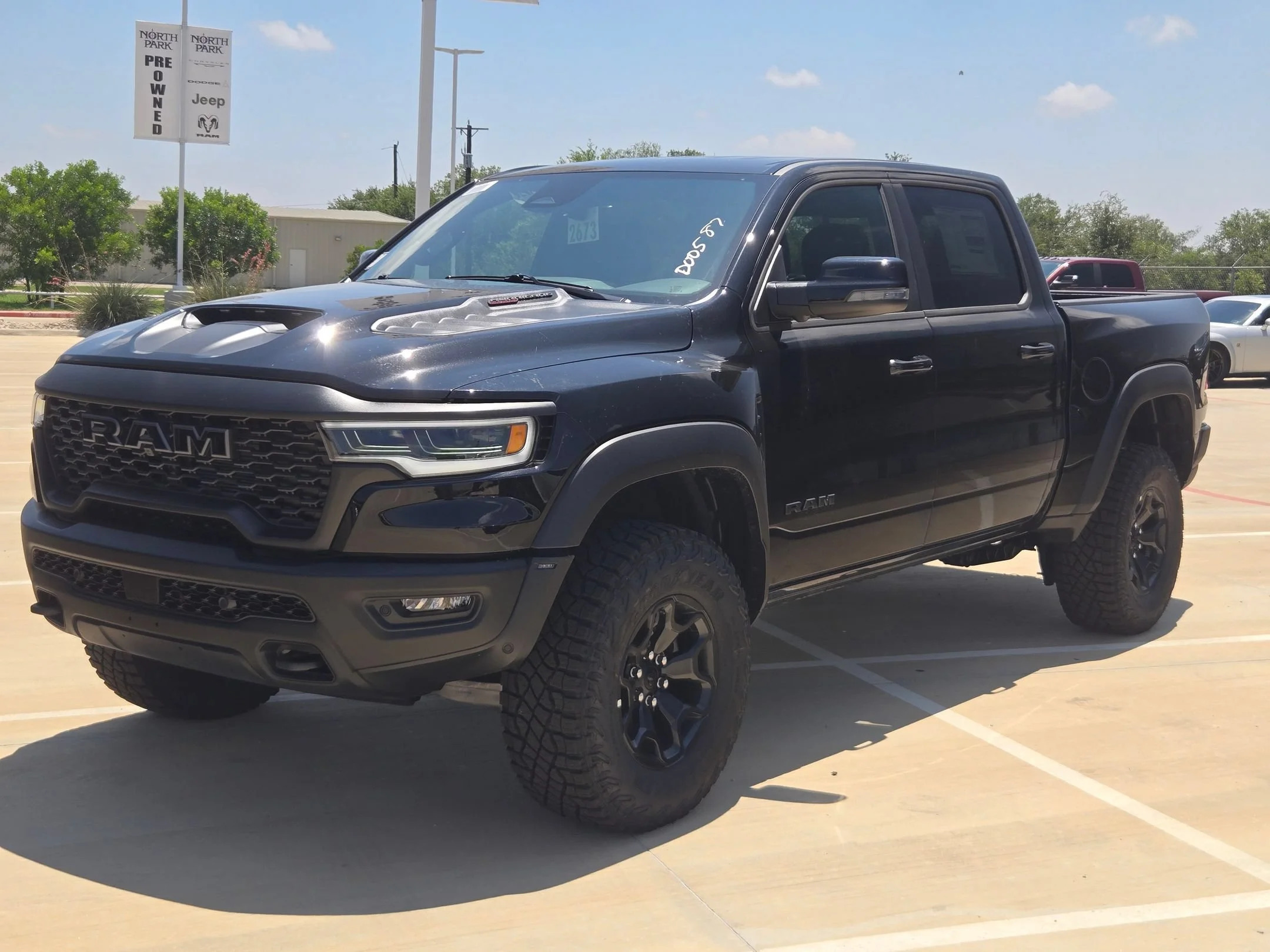 New 2026 Diamond Black Crystal Pearl-Coat Exterior Paint RAM RHO image 7