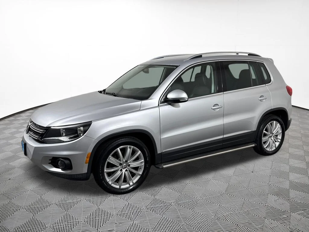 Used 2014 Volkswagen Tiguan SE with VIN WVGBV3AX1EW541677 for sale in Chippewa Falls, WI