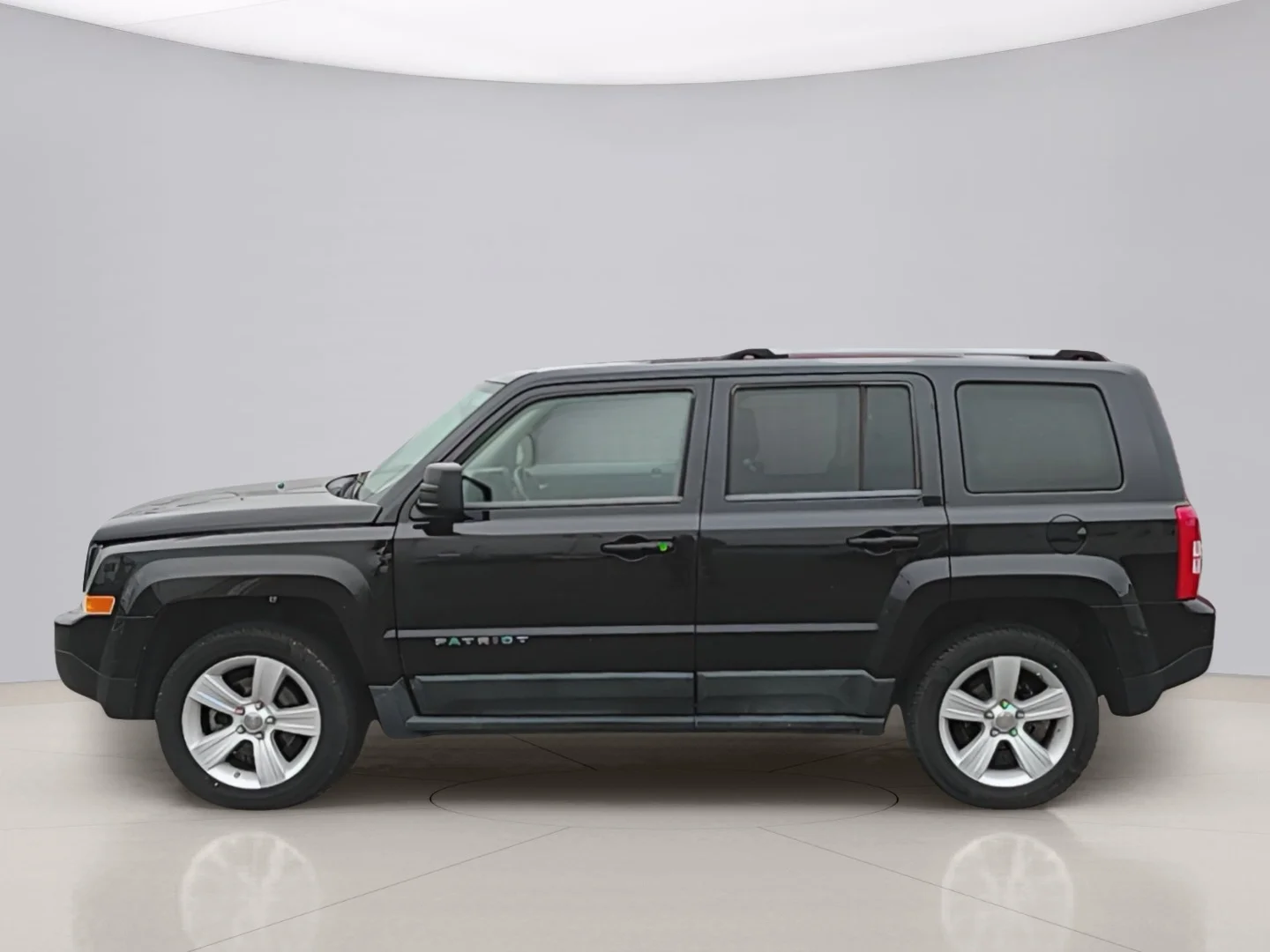 Used 2011 Black Jeep LATITUDE X image 2