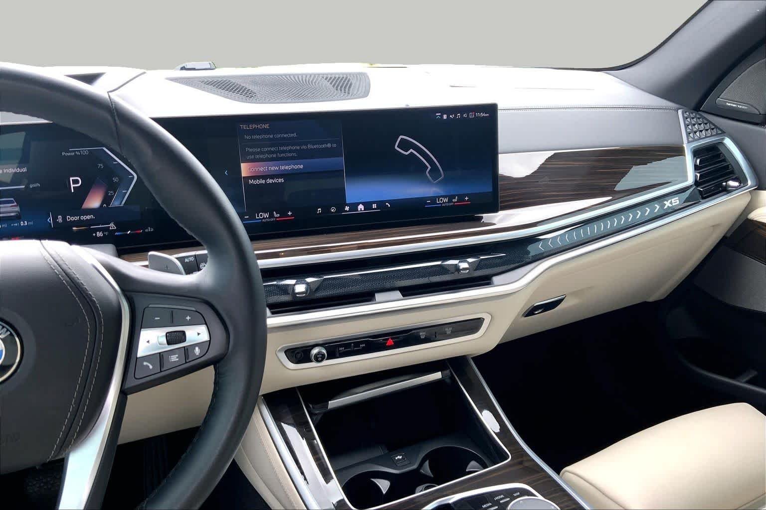Used 2024 Mineral White Metallic BMW xDrive40i image 6