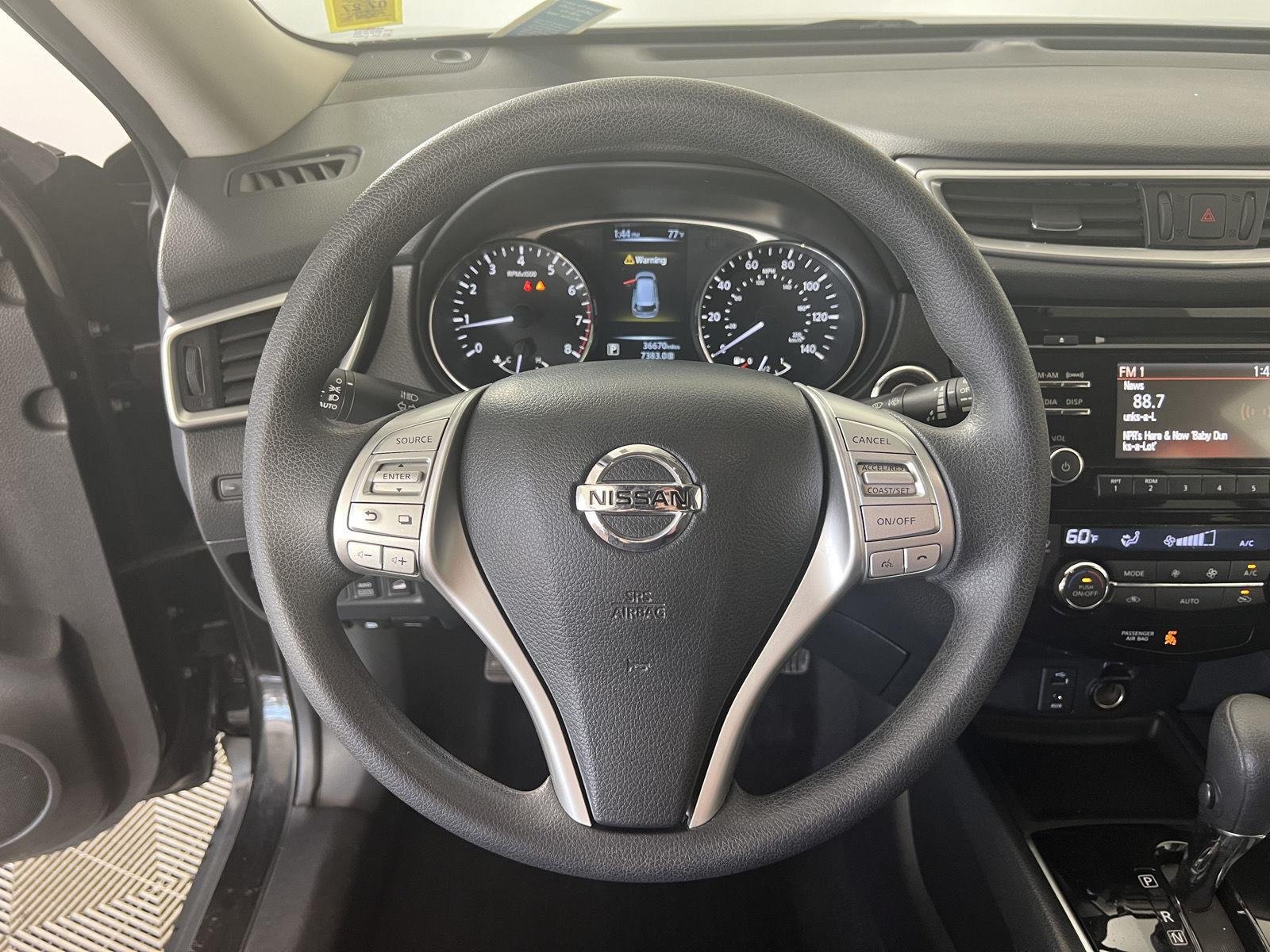 Used 2016 Magnetic Black Nissan SV image 10