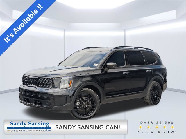 Used 2025 Black Kia EX X-Line image 1