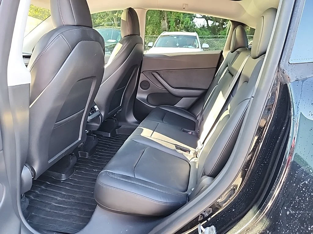 Used 2022 Solid Black Tesla Performance image 3