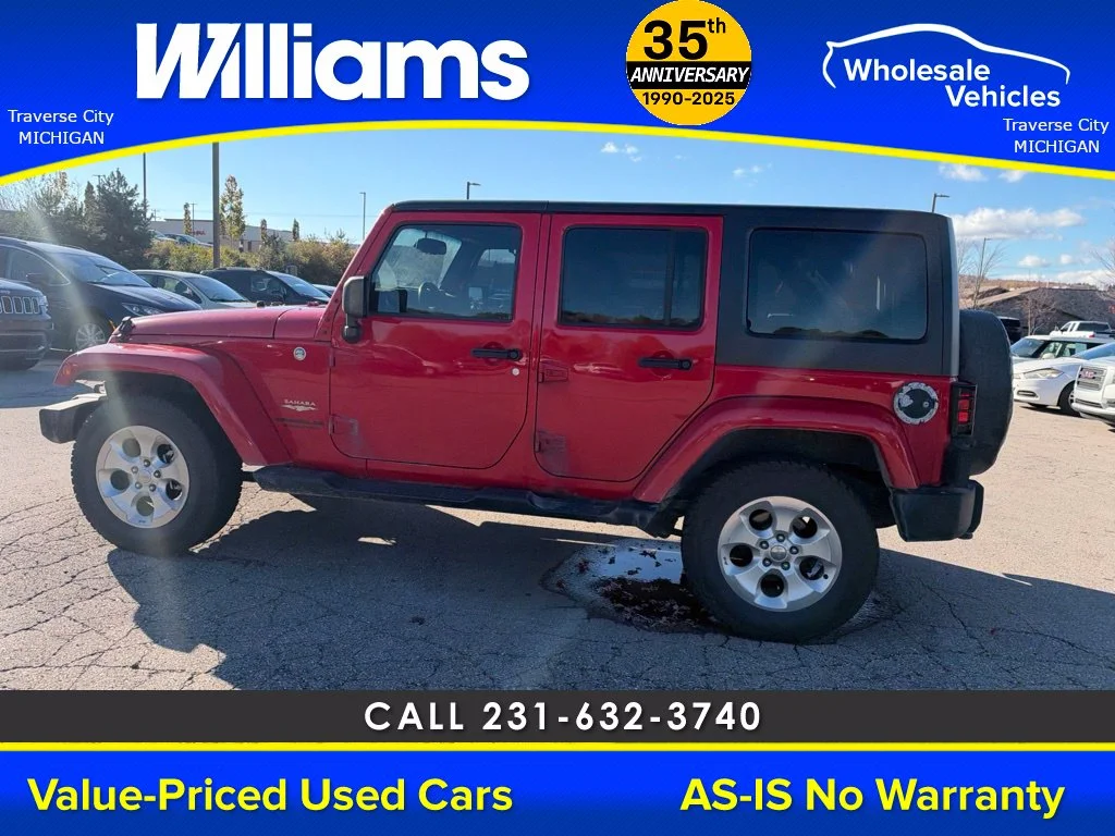 Used 2013 Flame Red Jeep Unlimited Sahara image 13