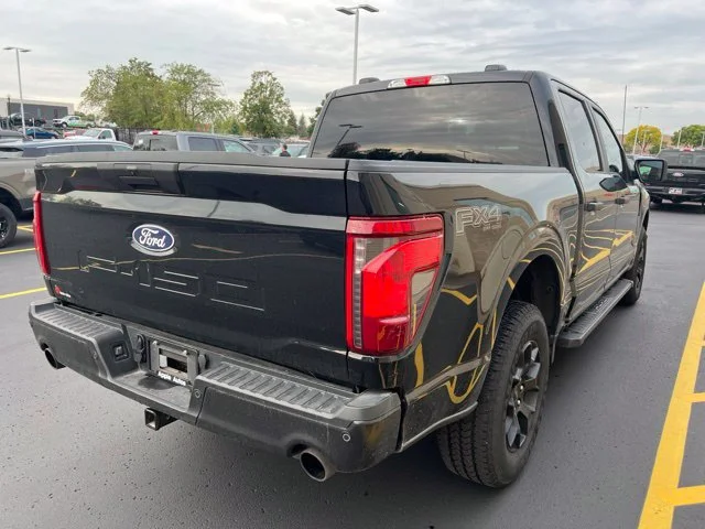 Certified Used 2025 Black Ford STX image 2