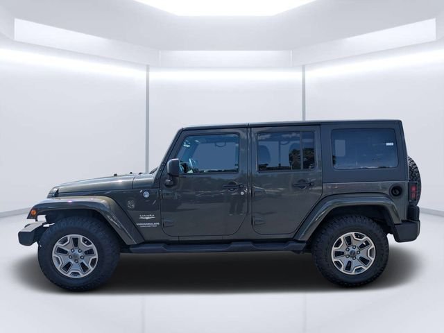 Used 2015 Green Jeep Unlimited Sahara image 6