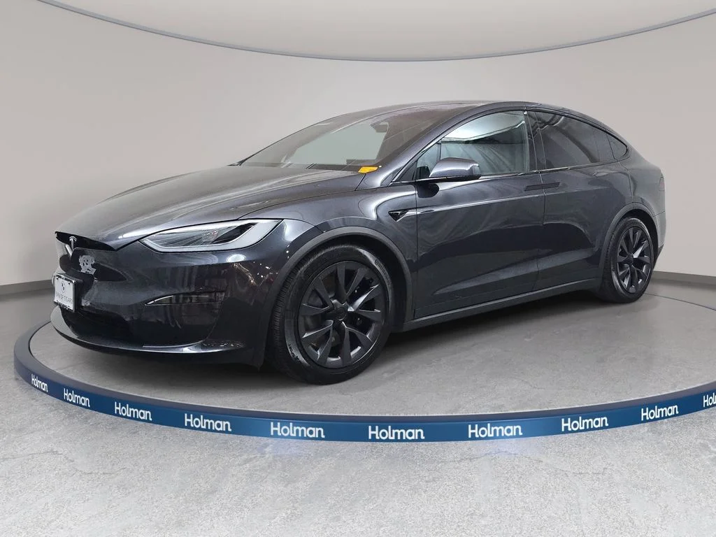 Used 2025 Stealth Gray Tesla Base image 1