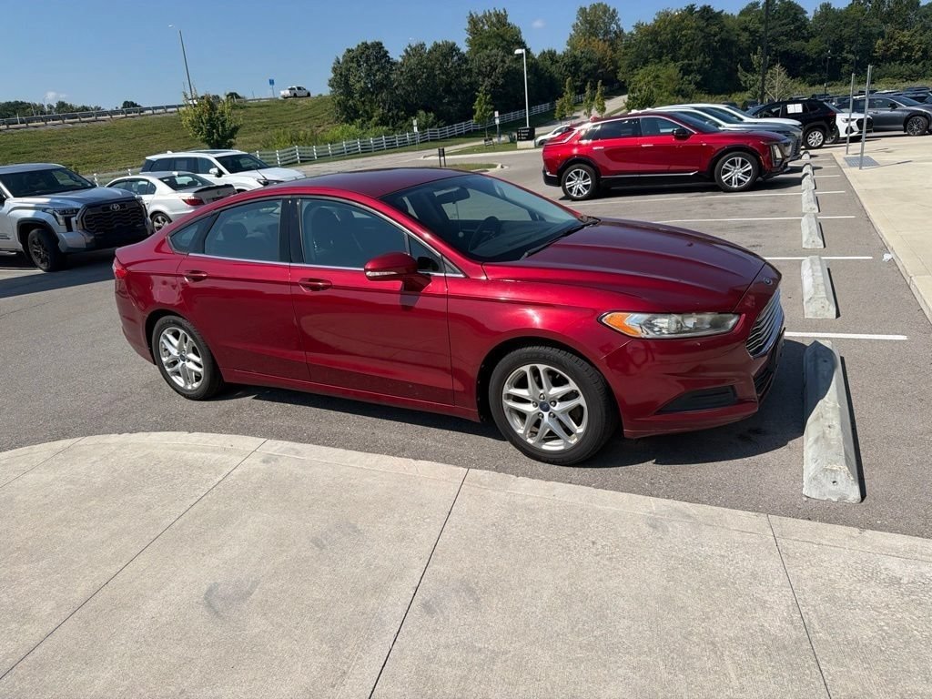 Used 2013 Ruby Red Metallic Ford SE image 4