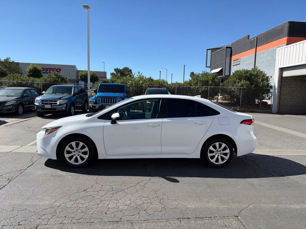 Used 2025 White Toyota LE image 2