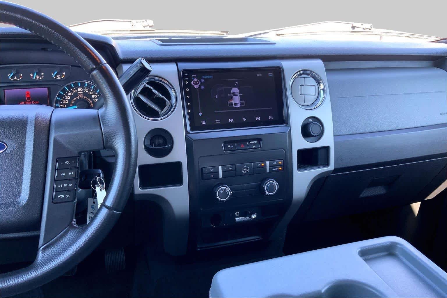 Used 2012 Dark Blue Pearl Metallic Ford XLT image 7