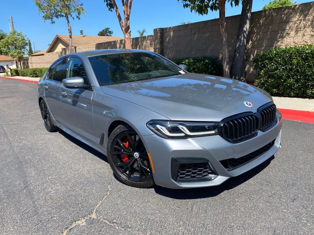Used 2023 Gray BMW M550i xDrive image 1