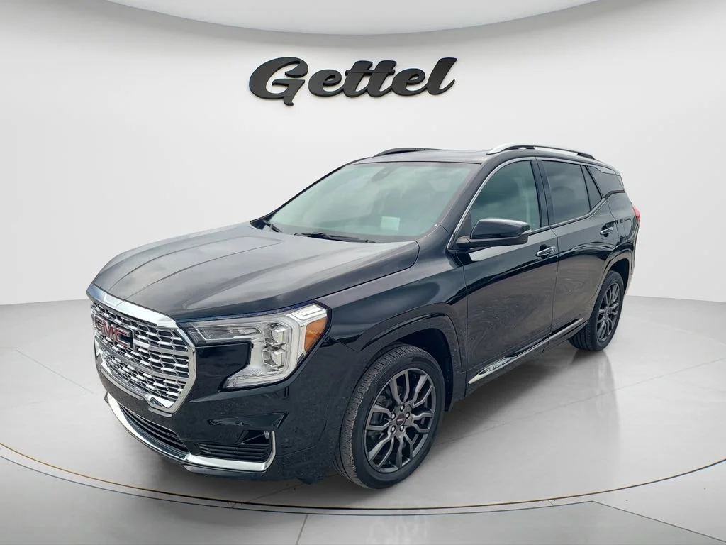 Used 2023 Ebony Twilight Metallic GMC Denali image 1