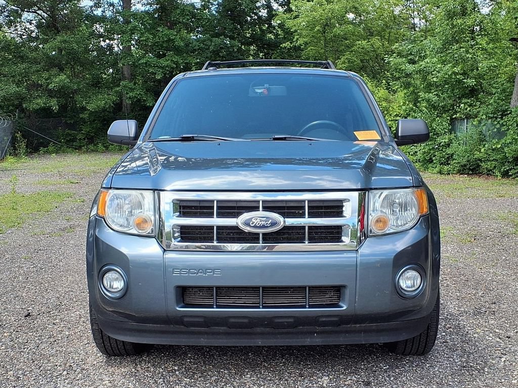 Used 2010 Ford Escape XLT with VIN 1FMCU0DG6AKC24108 for sale in Howell, MI