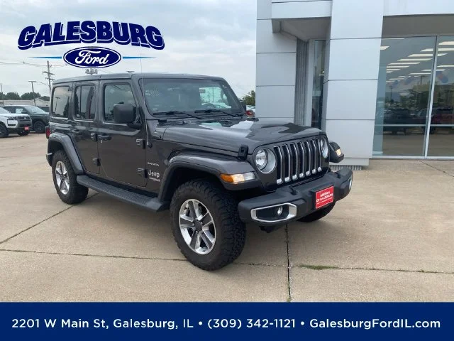 Used 2019 Granite Crystal Clearcoat Metallic Jeep Unlimited Sahara image 1