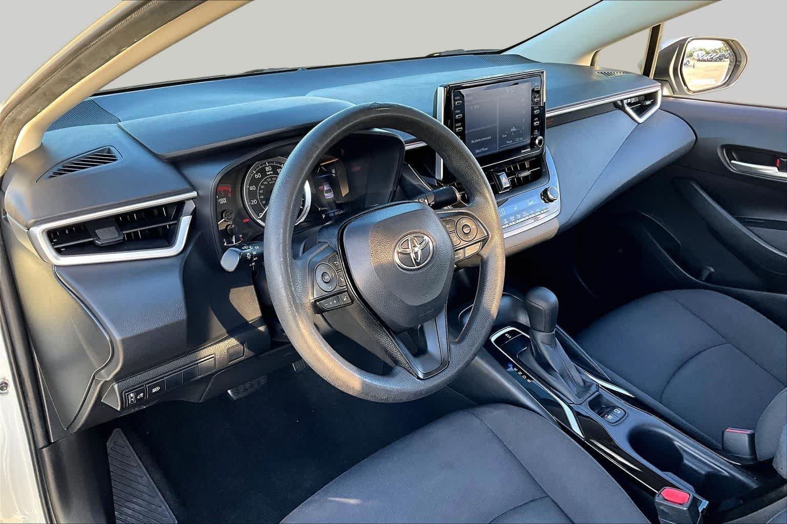 Used 2021 Super White Toyota LE image 18