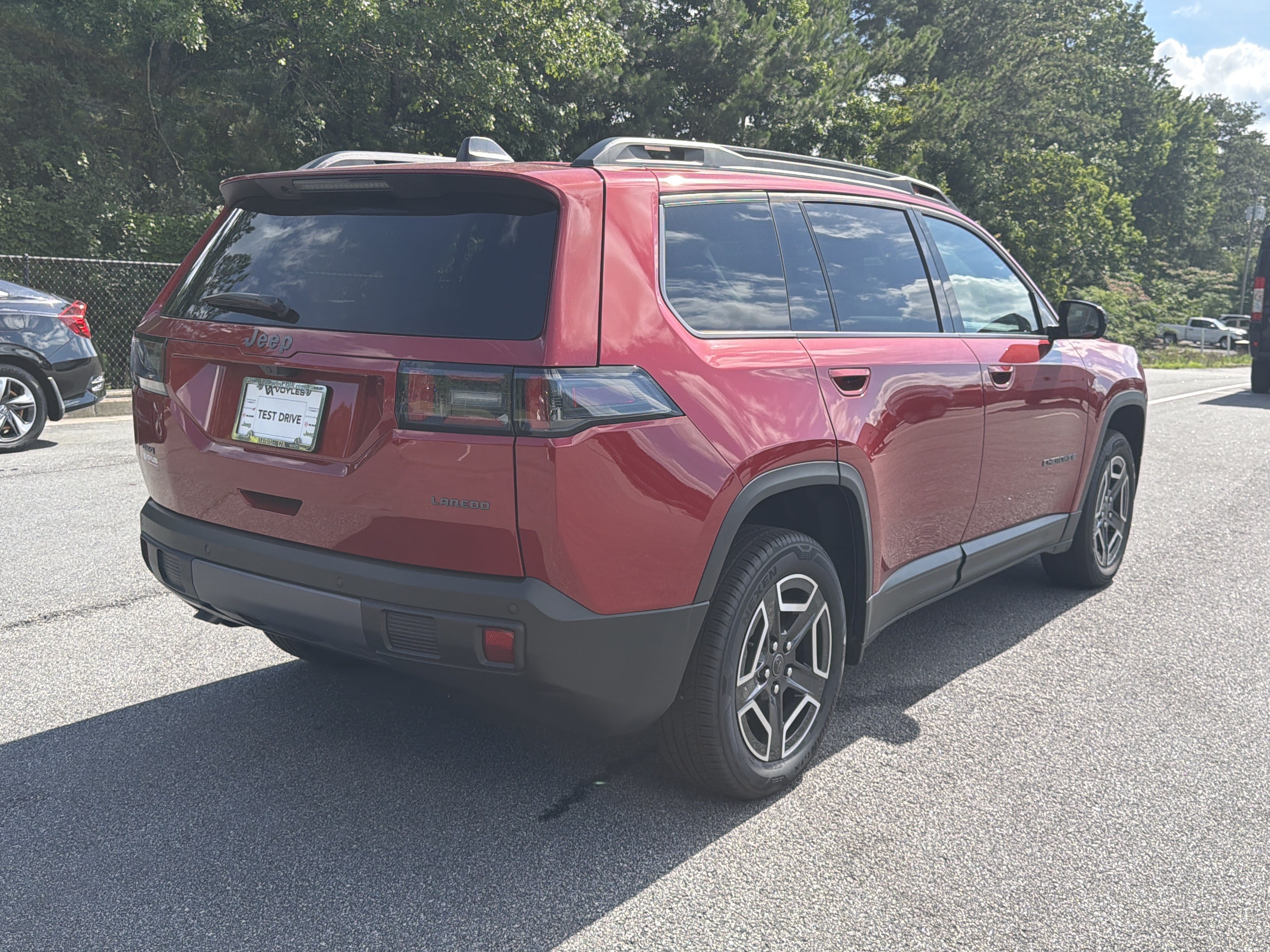 New 2026 Red Hot Pearlcoat Jeep Laredo image 8