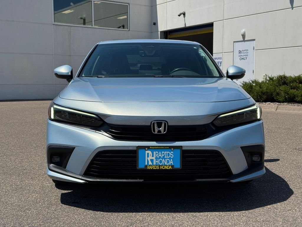Used 2022 Honda Civic Touring with VIN 2HGFE1F93NH313037 for sale in Coon Rapids, Minnesota