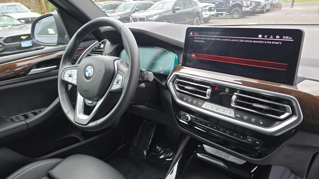 Used 2024 Black Sapphire Metallic BMW xDrive30i image 11