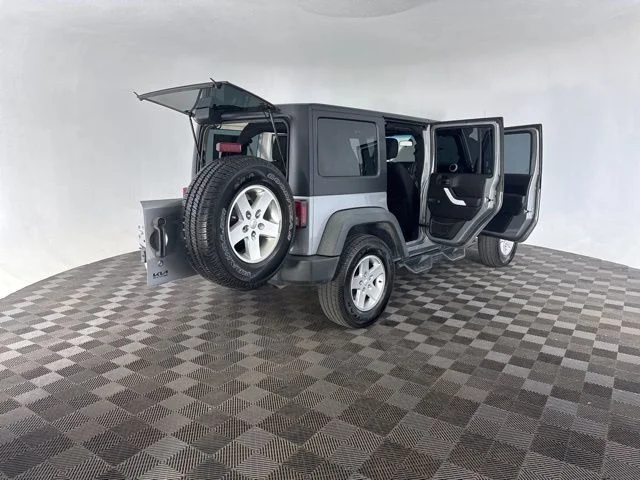 Used 2014 Silver Jeep Unlimited Sport image 16