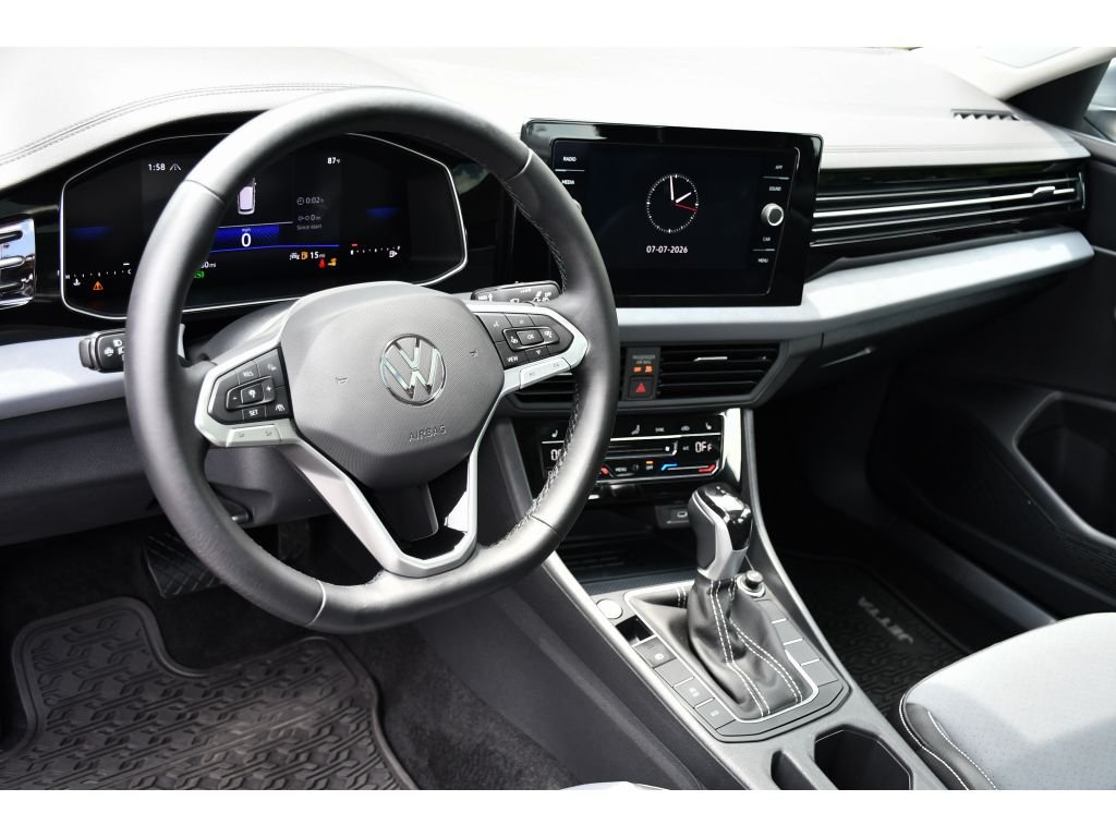 Used 2025 Pyrite Silver Metallic Volkswagen SE image 13