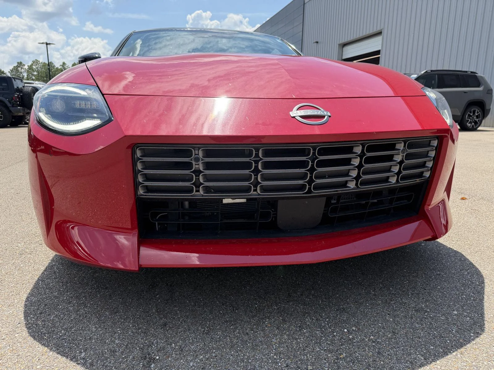Used 2025 Solid Red/Super Black Nissan Performance image 20