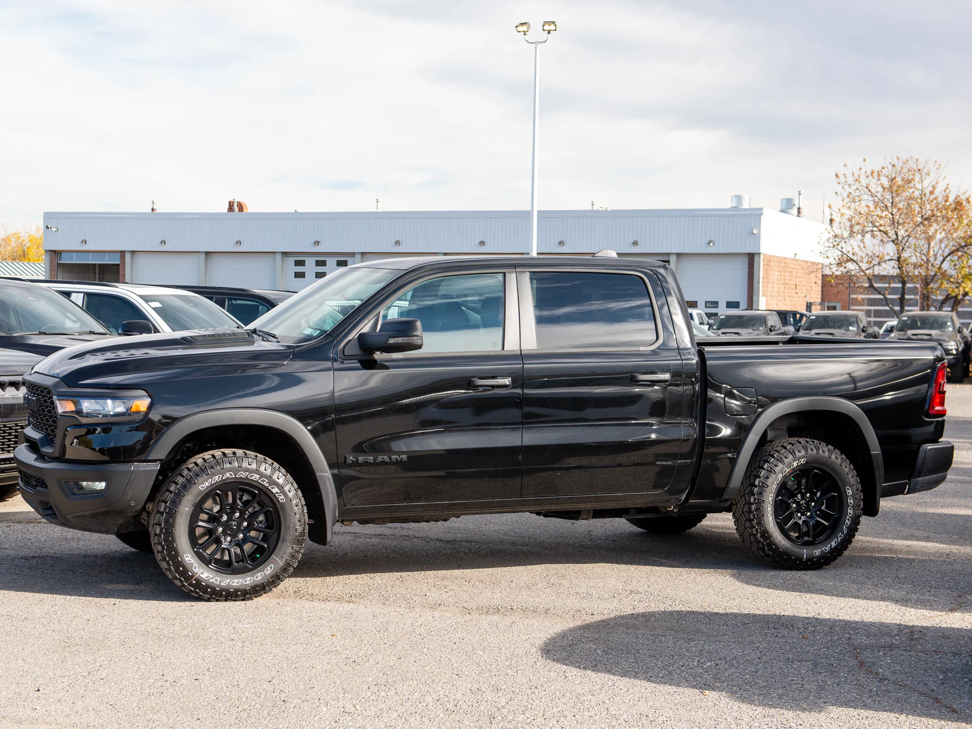 New 2026 Black RAM Rebel* Crew Cab 4x4, Heated Seats/Wheel, 33 Inch Tires, Nav, Alpine Audio image 3