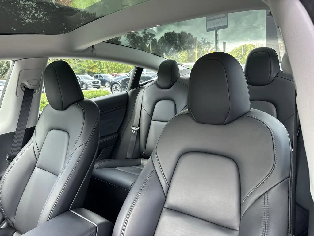 Used 2023 Solid Black Tesla  image 42