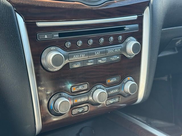 Used 2016 Magnetic Black Nissan Platinum image 16