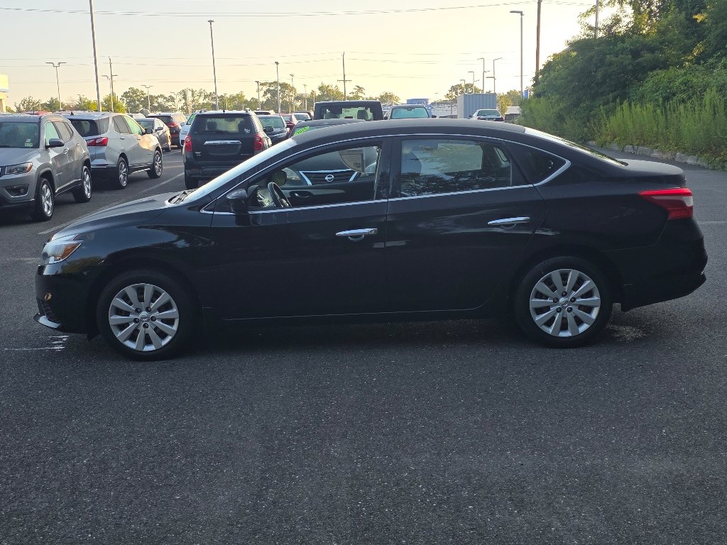 Used 2016 Super Black Nissan S image 9