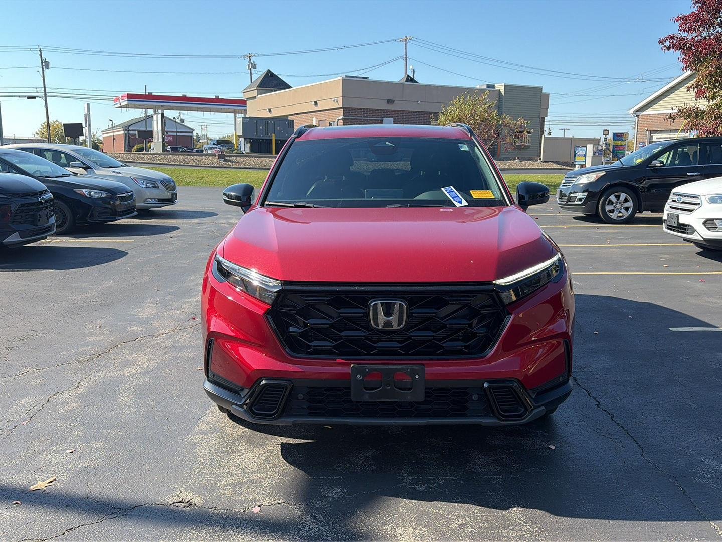 Used 2024 Radiant Red Metallic Honda Sport-L image 2