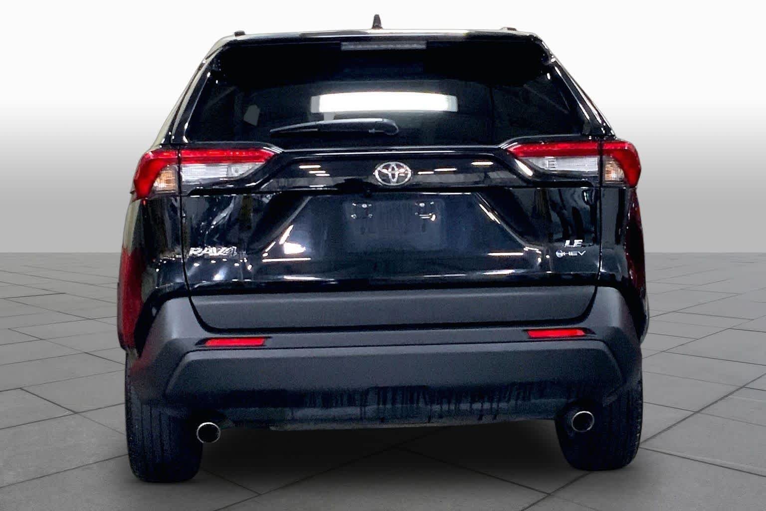 Used 2025 Midnight Black Metallic Toyota Hybrid LE image 5