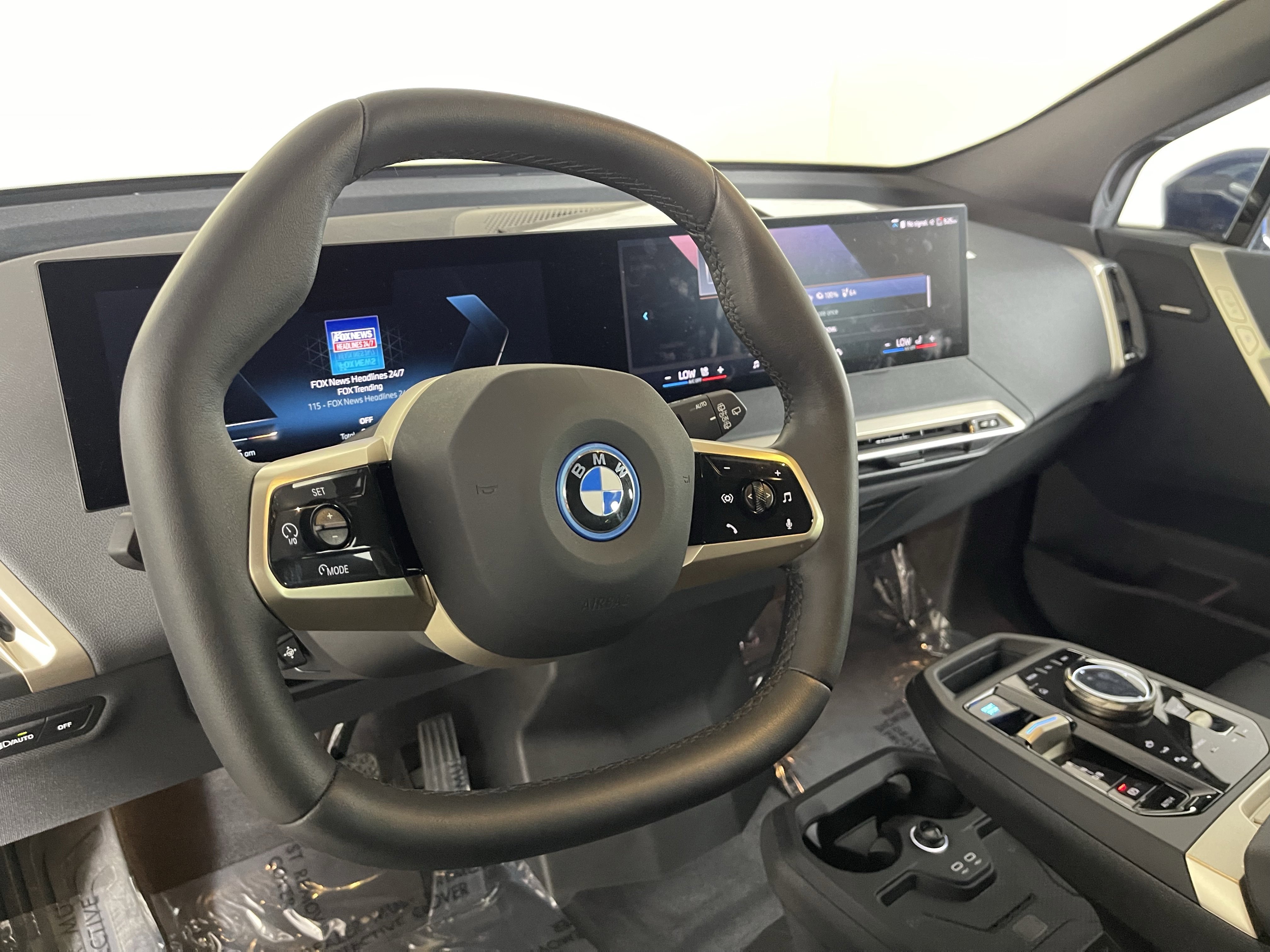 Certified Used 2025 Phytonic Blue Metallic BMW xDrive50 image 12