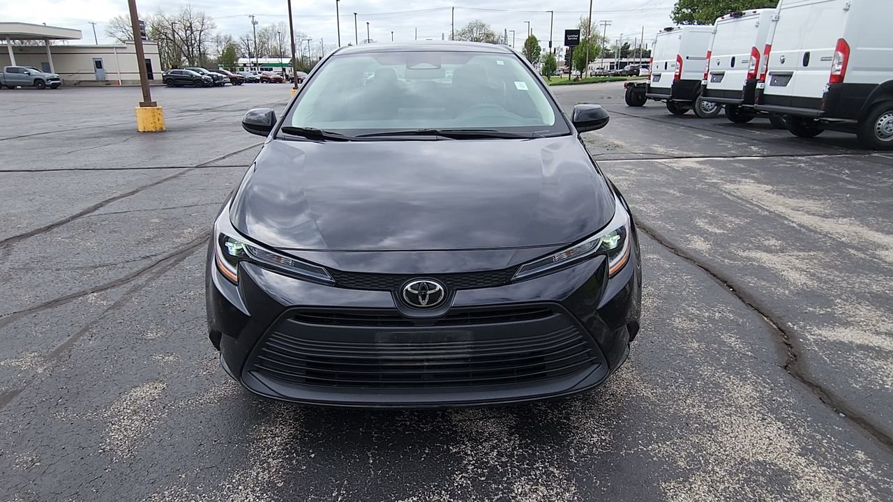 Used 2024 Midnight Black Metallic Toyota LE image 3