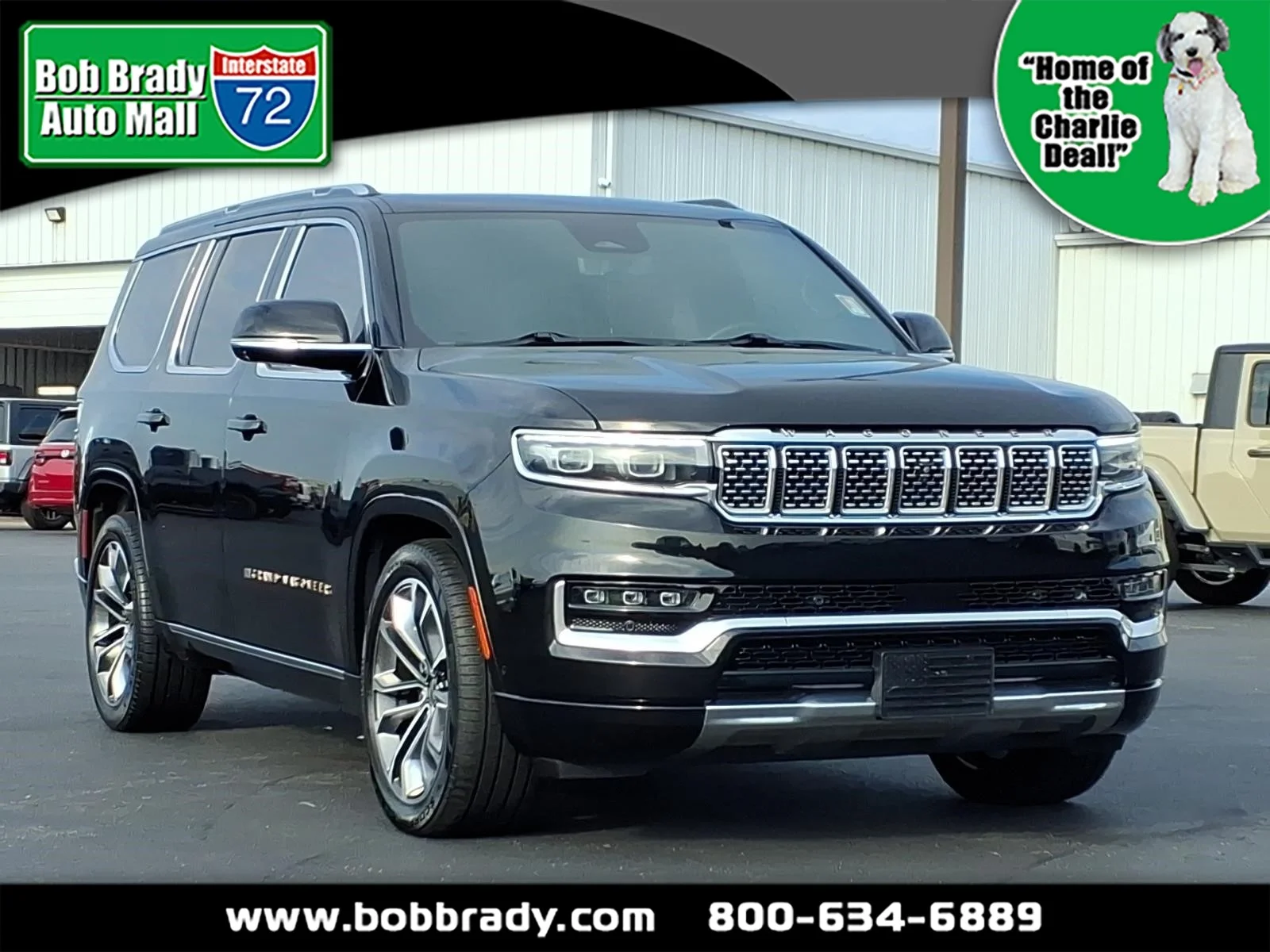 Used 2023 Diamond Black Crystal Pearl Coat Jeep Series III image 1