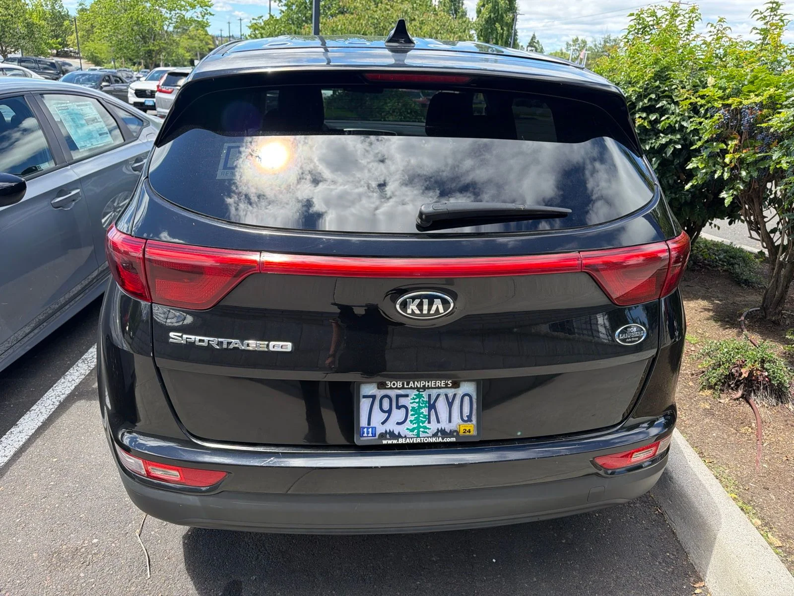 Used 2018 Black Cherry Kia LX image 4