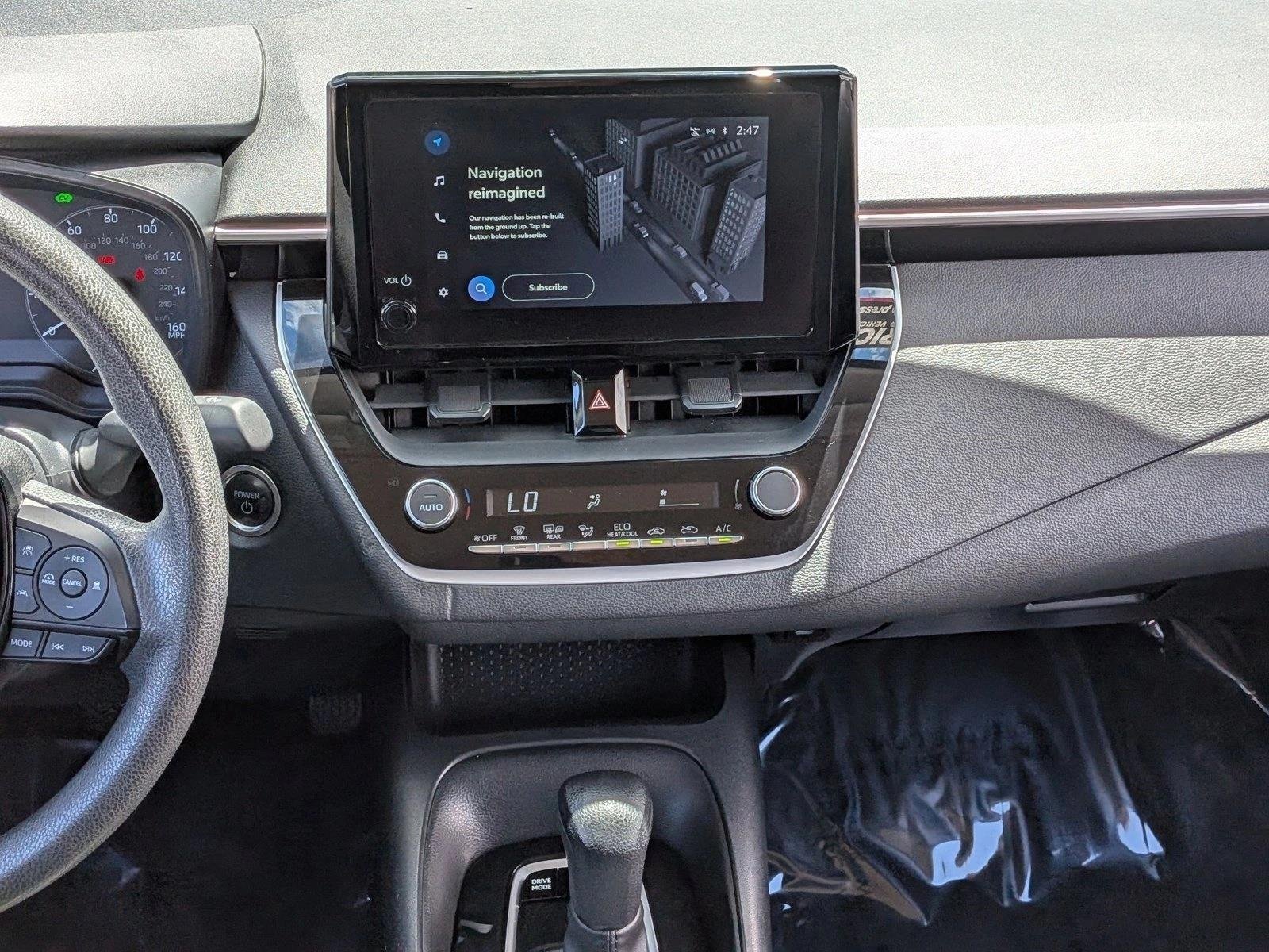 Used 2024 Midnight Black Metallic Toyota Hybrid LE image 12