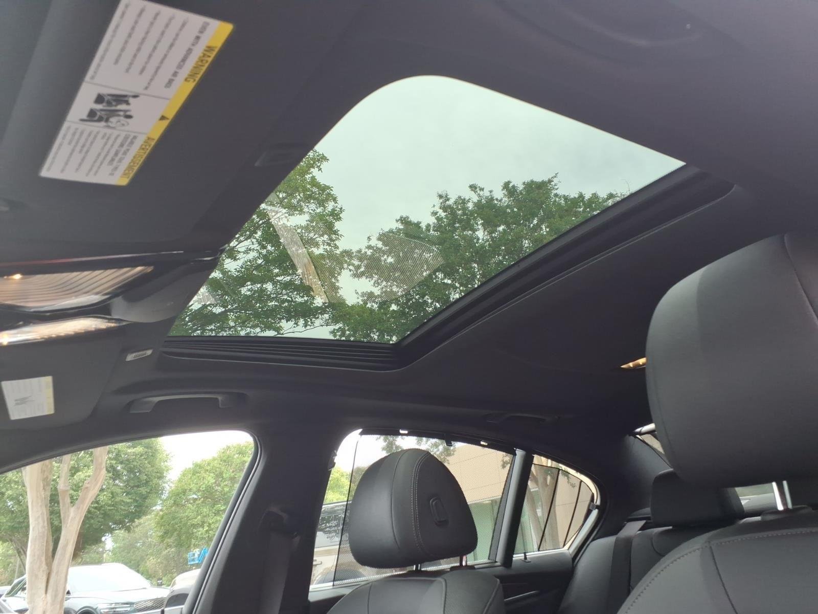 Used 2023 Skyscraper Gray Metallic BMW 530i image 25