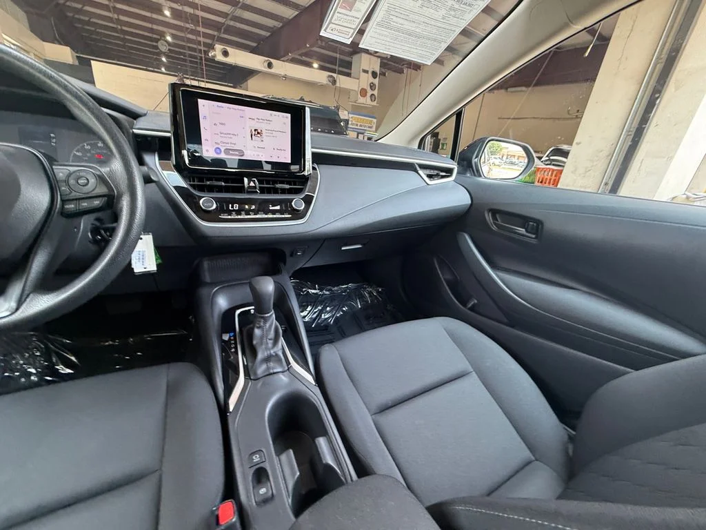 Used 2024 Black Toyota LE image 15