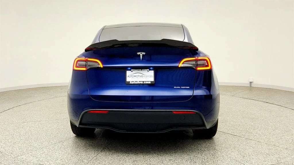 Used 2024 Deep Blue Metallic Tesla Long Range AWD w/ Full Self-Driving & Aero Disc Wheel Covers image 6