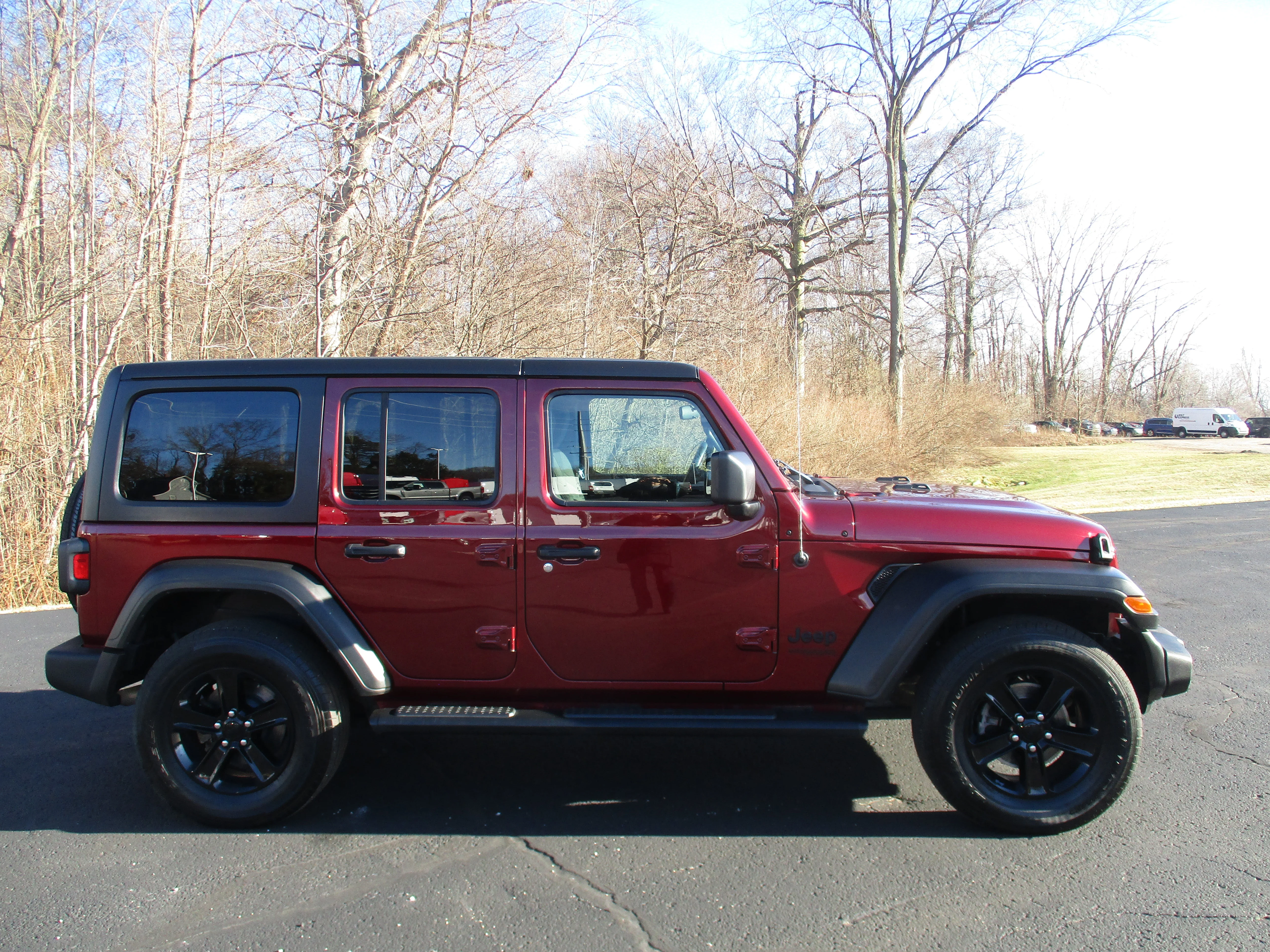 Used 2021 Snazzberry Pearlcoat Jeep Unlimited Sport Altitude image 6