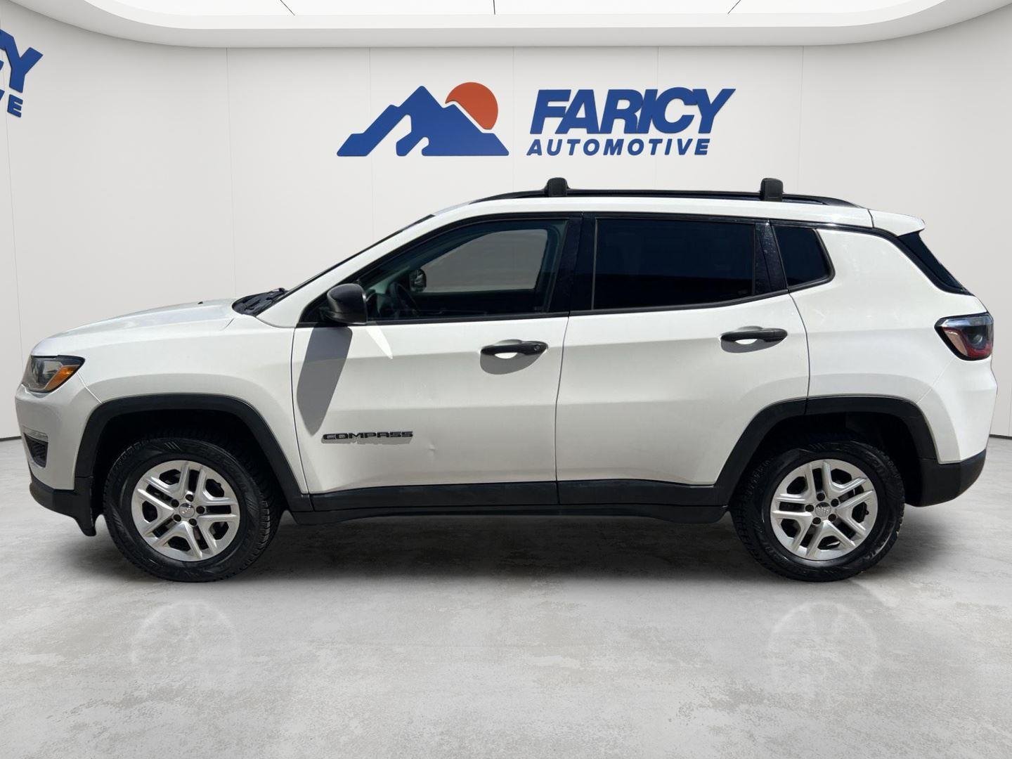 Used 2018 White Clearcoat Jeep Sport image 8