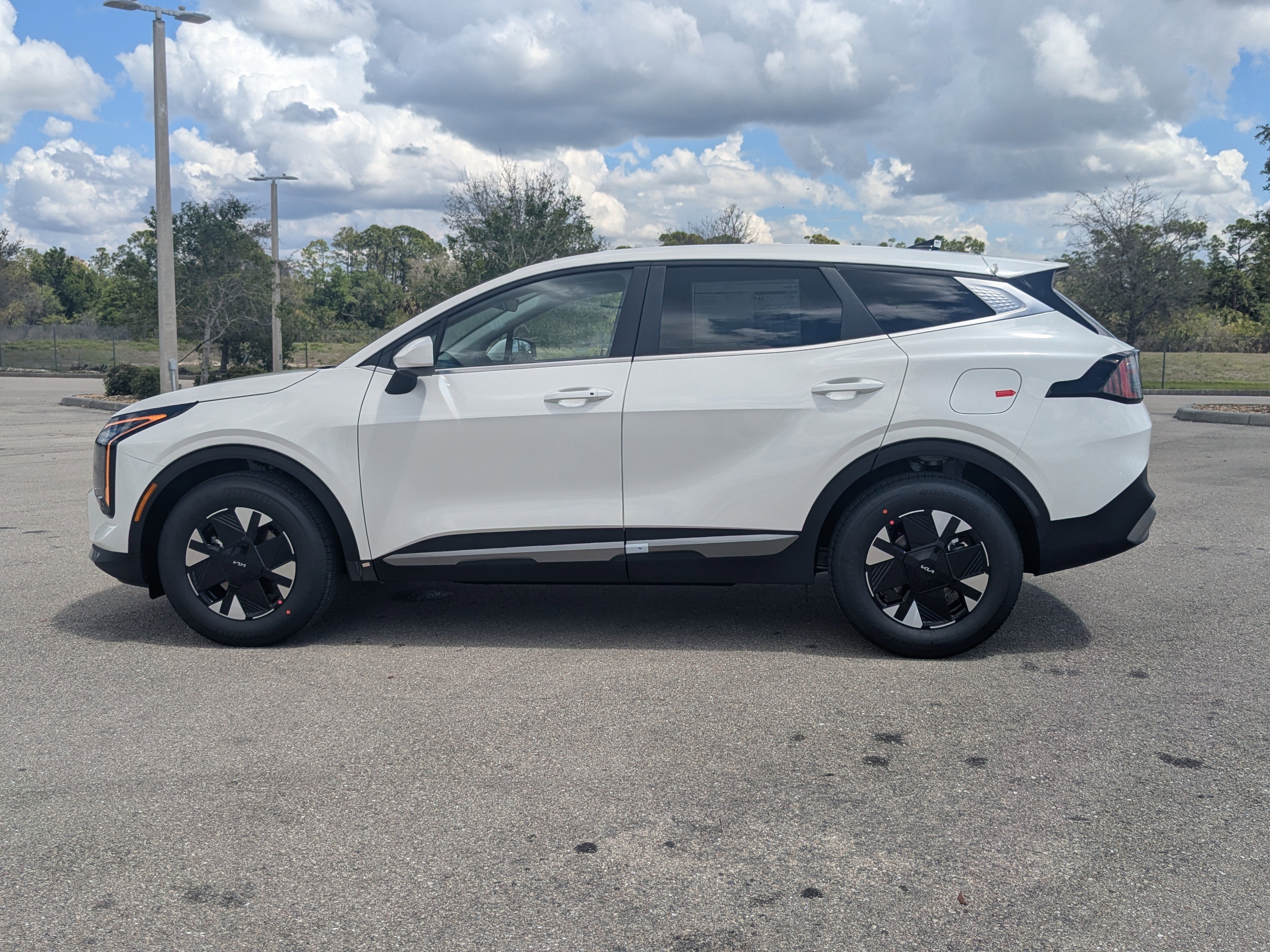 New 2026 Snow White Pearl Kia LX image 8