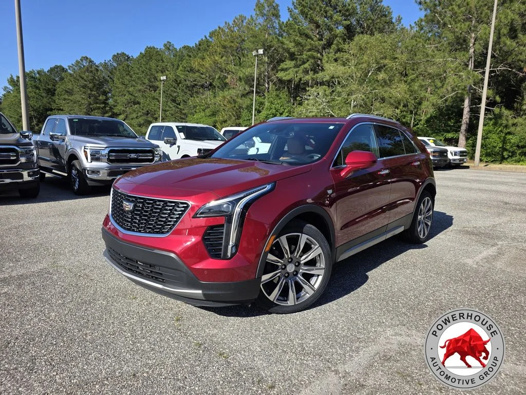 Used 2019 Red Cadillac Premium Luxury image 1