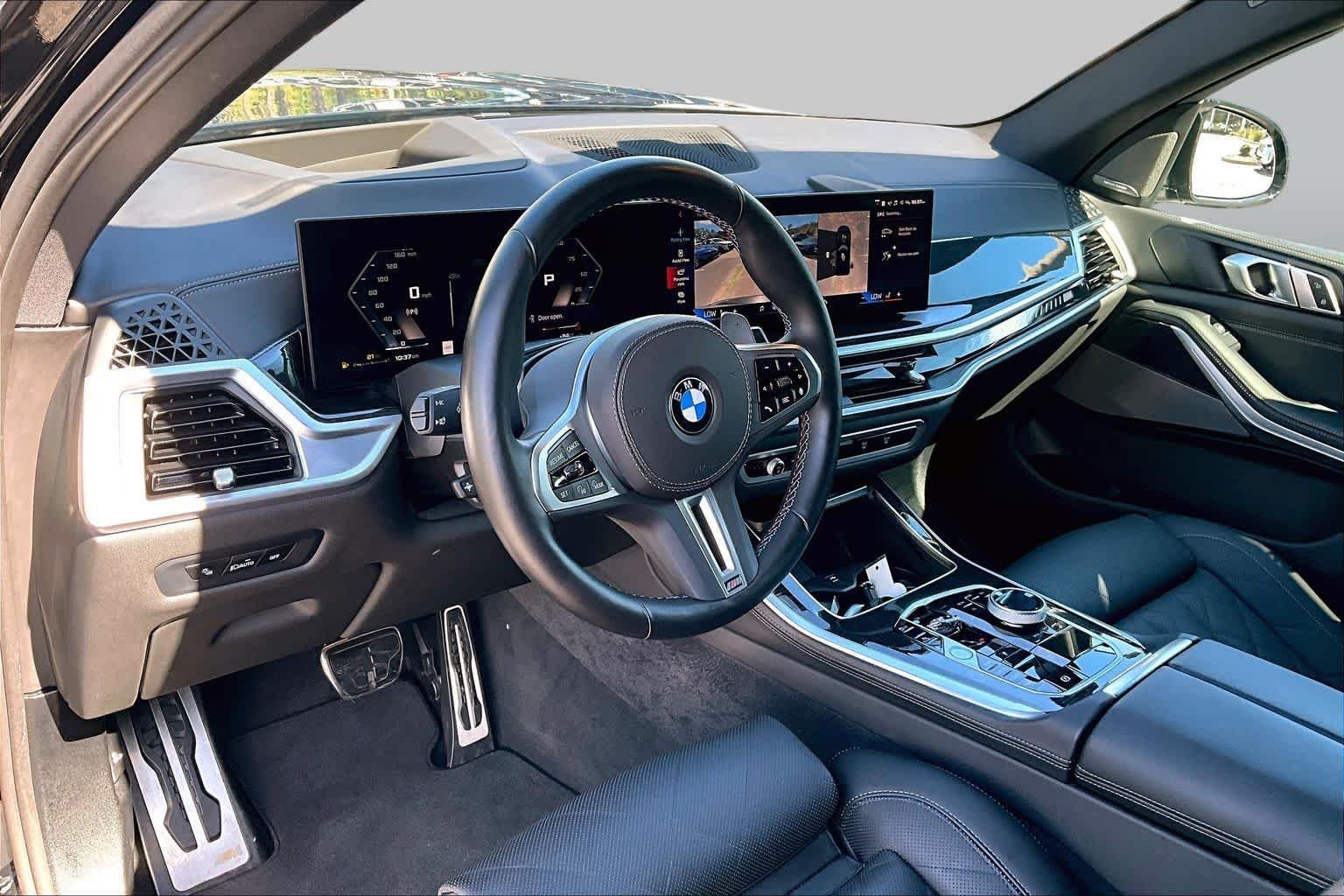 Used 2026 Black Sapphire Metallic BMW M60i image 18