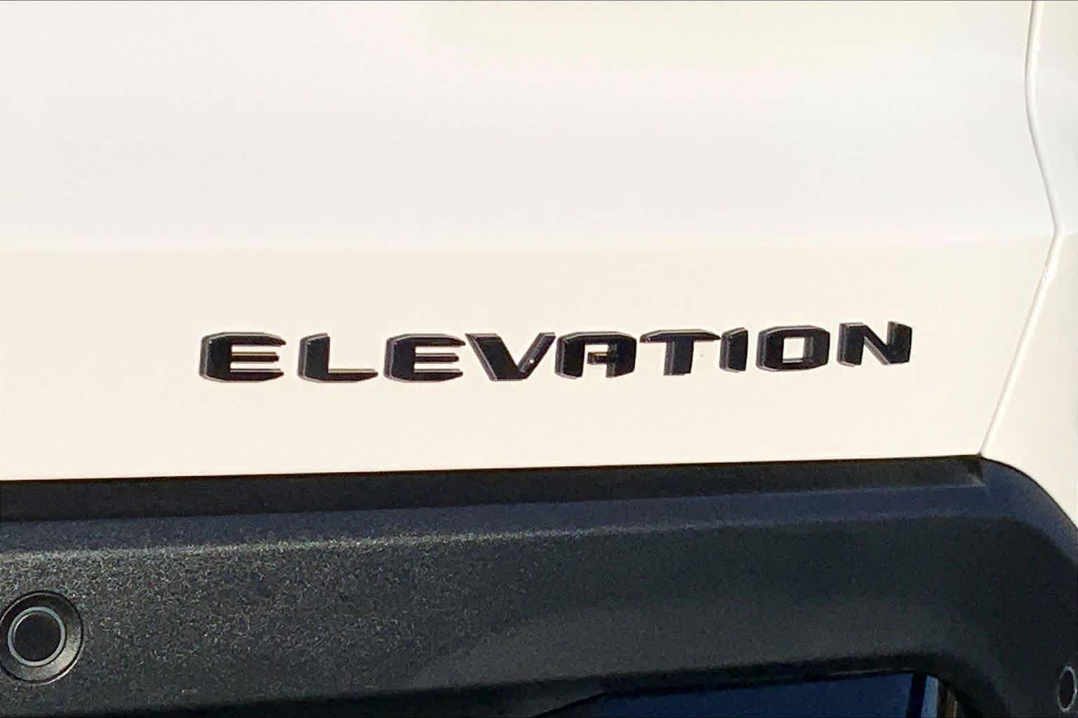 Used 2026 Summit White GMC FWD Elevation image 10