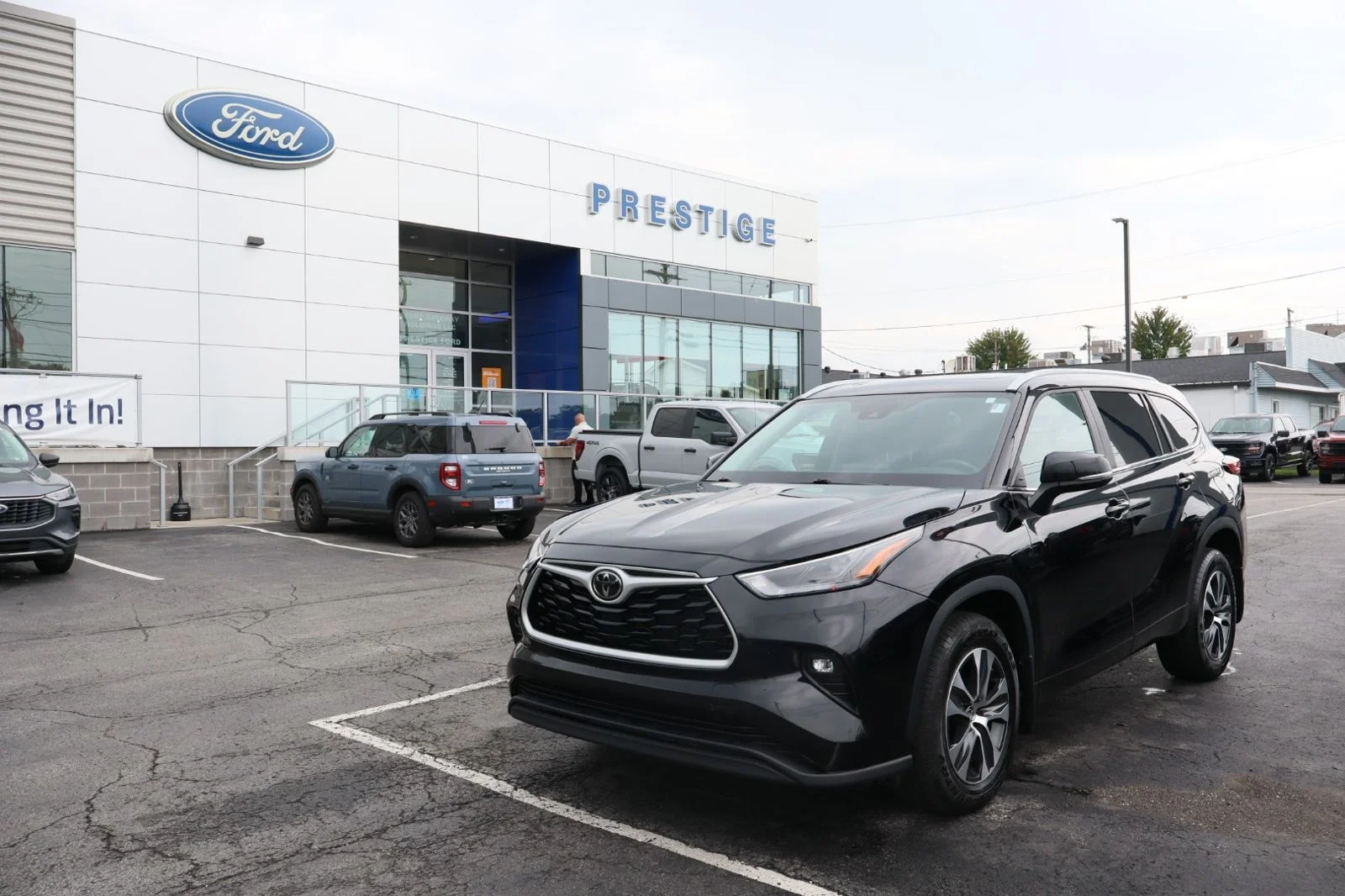 Used 2023 Midnight Black Metallic Toyota XLE image 1