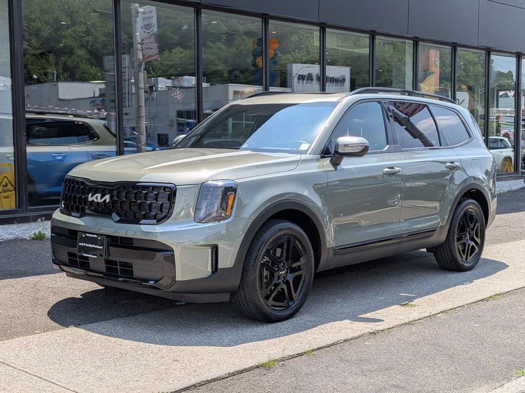 Used 2024 Green Kia EX X-Line image 1