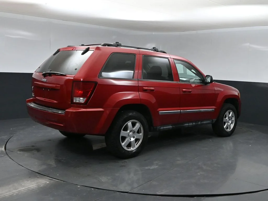 Used 2010 Red Jeep Laredo image 2
