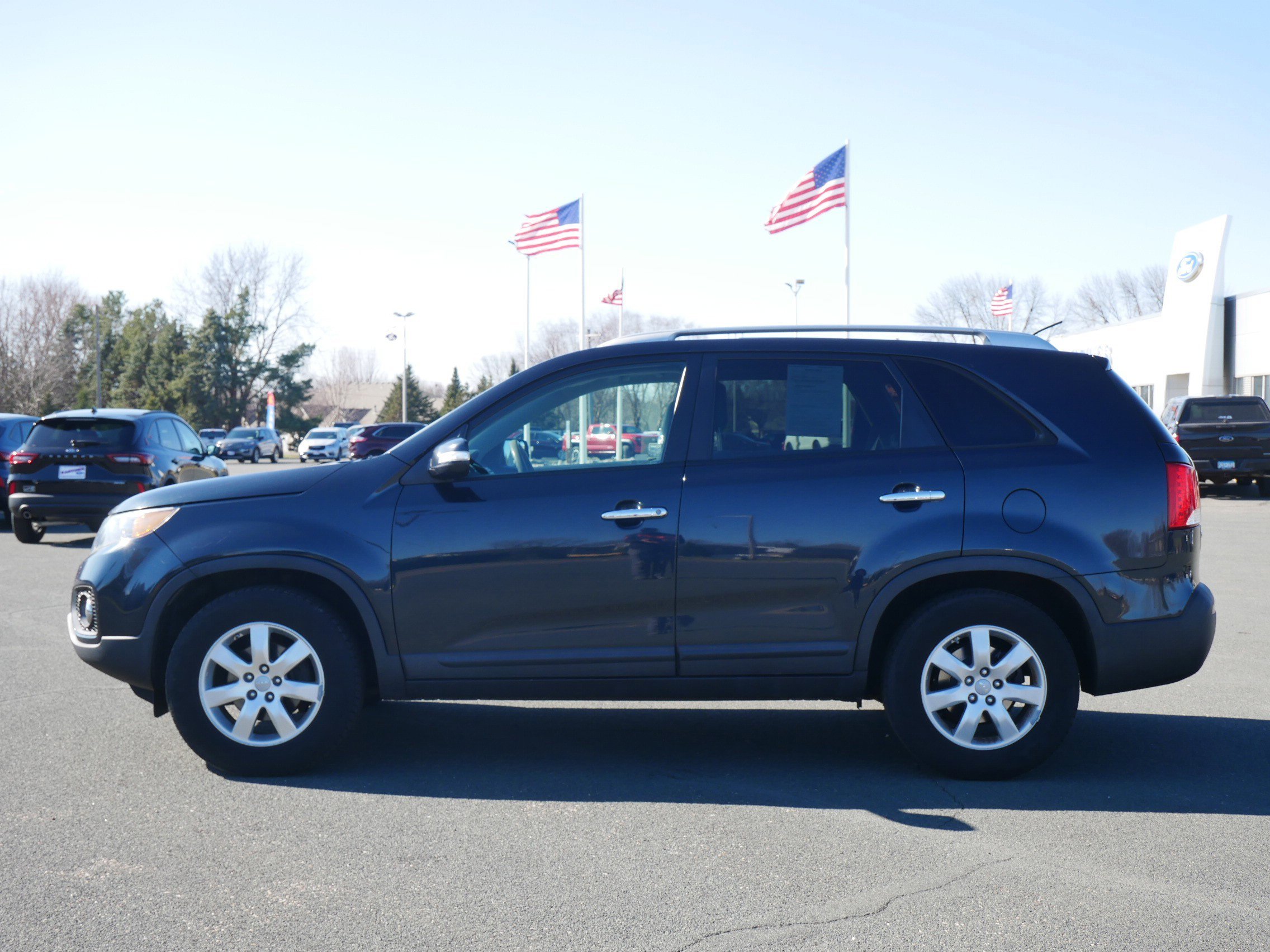 Used 2013 Kia Sorento LX with VIN 5XYKT3A61DG390028 for sale in Hastings, Minnesota